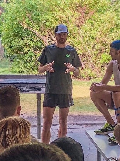 Jared Ward wearing a Rapid Reboot shirt